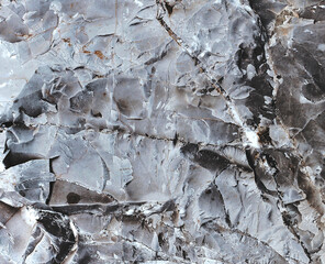 Wall marble. Brown texture. Stone background. Rock texture. Grunge Rough structure. Abstract texture. Rock surface with cracks. Rock pile. Paint spots wall.