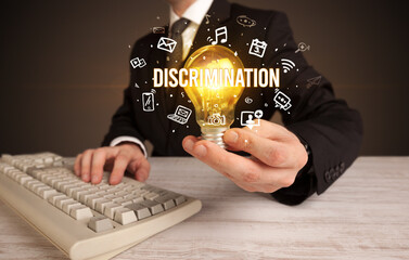 Businessman holding a light bulb, social media concept