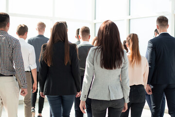 young business people walking together in a new office