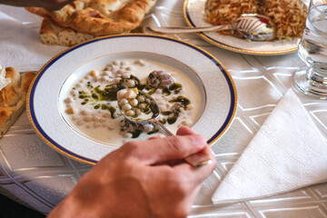 Man Eating Yuvarlama Meal In Gaziantep. Yuvarlama Is Special Meal For Ramazan Holiday For Turkish People. Selective Focus
