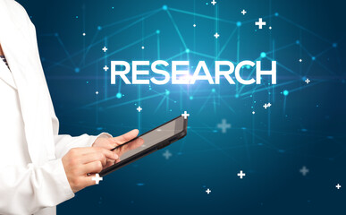 Doctor fills out medical record