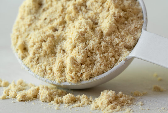 Vanilla Protein Powder Spilled from a Teaspoon