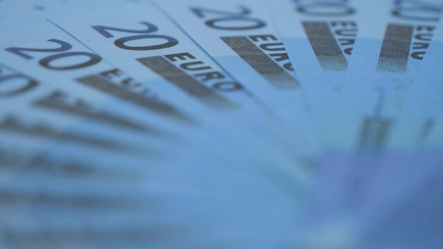 A close up view of 20 euro bills.