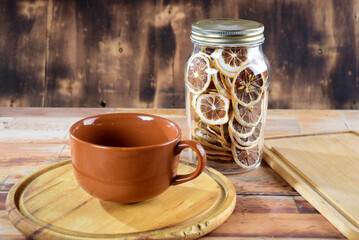 large empty cup for broth, soup and coffee, on the wooden table