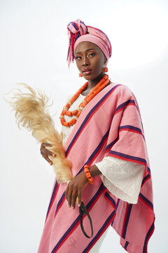 Portrait of a pretty young Nigerian woman dressed in local Traditional dress