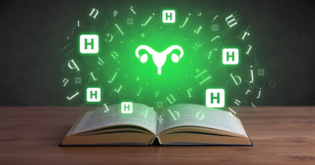 Open medical book with health icons above