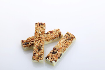 Healthy Snack, a Bar Made of Cereals and Nuts with Honey and White Chocolate.