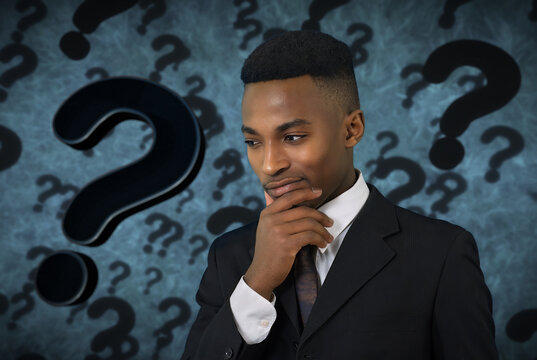 pensive young man thinking doubt expression question mark background