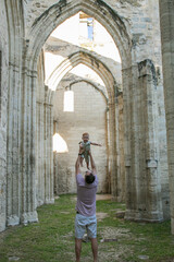 Fototapeta na wymiar Father Son France Europe Under Roman Ruins