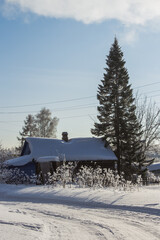 Snow covered house. Winter house. Winter Spaces