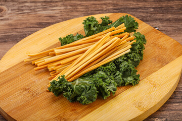 Chechel cheese sticks over board