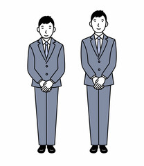 お辞儀をするスーツの男性