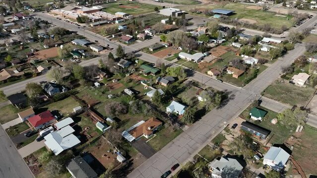 Aerial Monticello Utah city school. Settled in July 1887 by pioneers from The Church of Jesus Christ of Latter-day Saints. Farming, ranching, and uranium mining. Mountain valley.