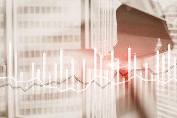 Bar graph on the background of a business center with a manager at the window