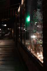 Fototapeta na wymiar Glass Window Storefront at Night