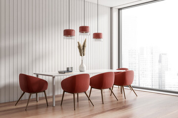 Dining room interior with table and chairs, red and white space design