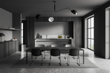 Grey kitchen interior with chairs and eating table, decoration and window
