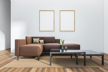 Modern lounge interior with couch and coffee table, mockup frames