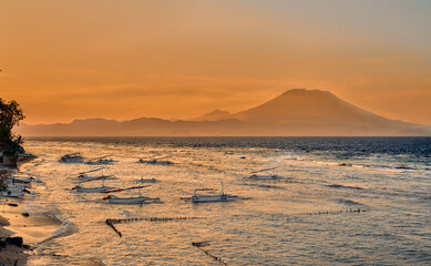 Early morning mood on Nusa Penida island, Bali, Indonesia. In background Balis highest active...