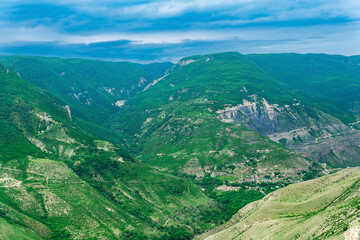 Fototapeta na wymiar Mountain landscape in the Caucasus in Dagestan, view of the canyon of the Sulak River with the village of Old Zubutli in the distance on the slope