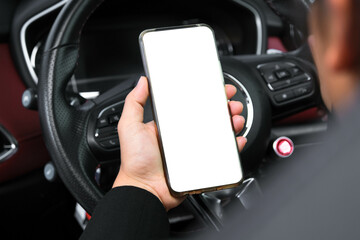 Close-up of woman's hands holding smartphone with empty space on screen for your text, background...