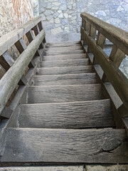 Fototapeta premium vintage staircase with stone wall