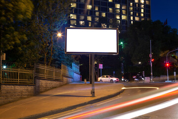 Blank billboard in the city traffic,copy space.Advertisement
