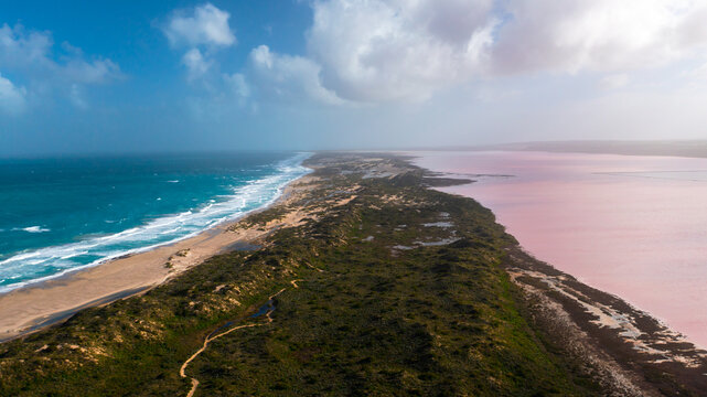Aerial image of beautiful Pink lake and blue ocean in Port Gregory, Western Australia