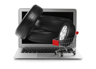 Online auto store, delivery service. Modern laptop, shopping cart and car tires on white background