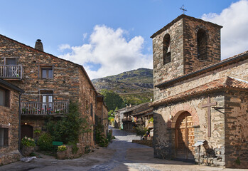 Streets of Valverde de los Arroyos (Spain). Typical stone constructions and black slate roofs. Rural.