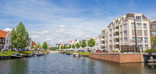 Obraz premium Panorama of a canal in the Waterfront neighbourhood in Harderwijk, Netherlands