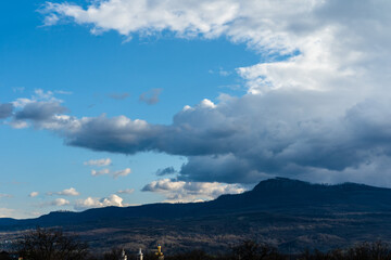 Beautiful dramatic sky over valley hills