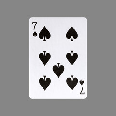 Seven of Spades. Isolated on a gray background. Gamble. Playing cards.