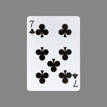 Seven of Clubs. Isolated on a gray background. Gamble. Playing cards.