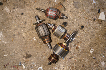 Old coils taken out of electric motors. Recycling of steel waste.