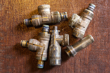 Old brass nuts and fittings for plumbing use recycling. Recycling of non-ferrous scrap.