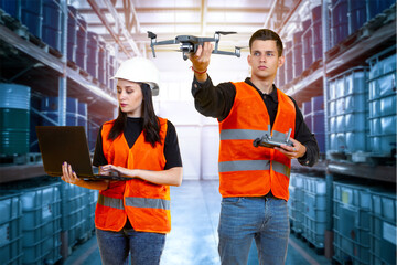 Modern warehouse tech. People with copter in their hands. Warehouse workers with drone. Racks with horses in background. Warehouse worker launches drone. Using quadcopter in logistic processes