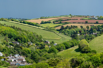 Obraz premium View from the South West Coastal Path near Thurlestone towards Buckland village in Devon