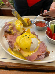 Poached Egg with Hollandaise Sauce served at Breakfast Restaurant.
