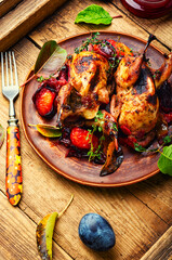 Whole quail stewed in plum