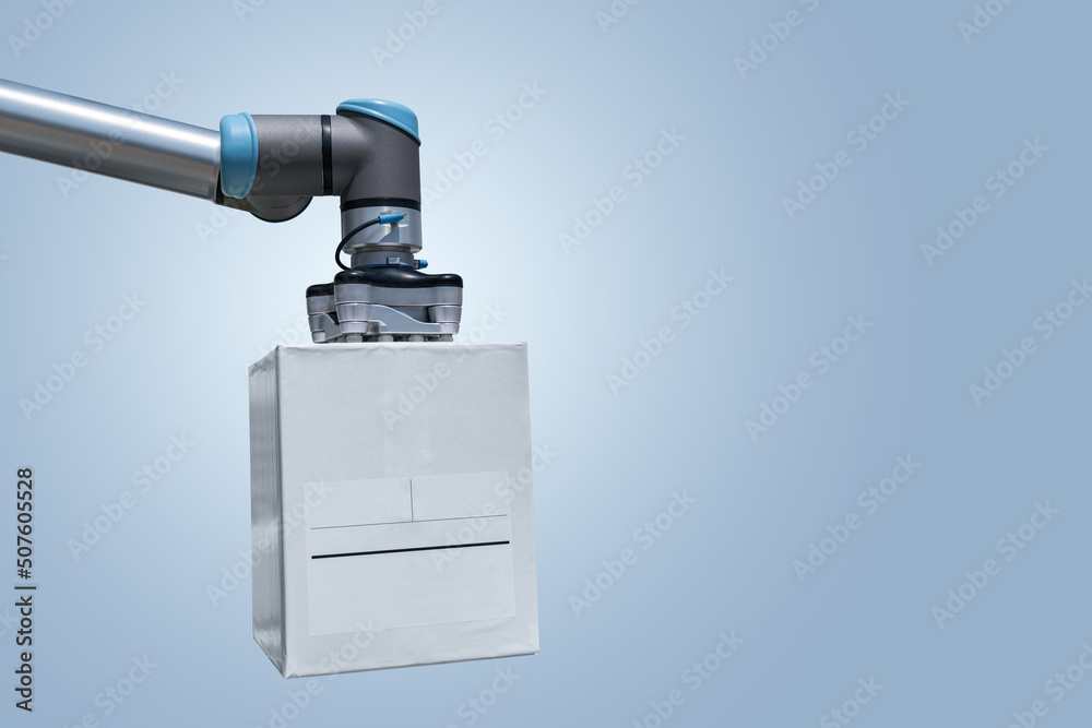 Poster Robot arm with box on a gray background. Smart industry 4.0 concept