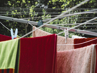 Dry colored towels, fresh air, clothes peg