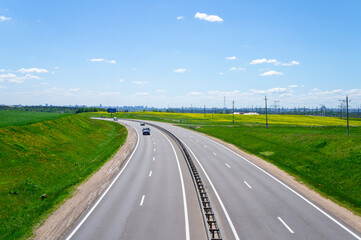 Beautiful landscape with road and highway on a sunny day. 25 May 2020, Minsk, Belarus