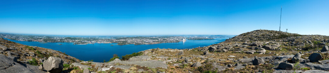 Fototapeta na wymiar A panoramic view to Lifjel summit peak and Gandsfjord fjord with Stavanger city, Norway, May 2018