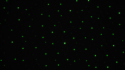 Blurry image of Abstract background.Green small dot-black light background