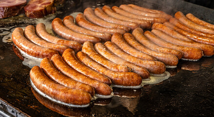 sausages prepared on a grill