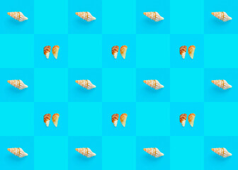 Flat Lay wallpaper background image of coastal seashells on a checkered background