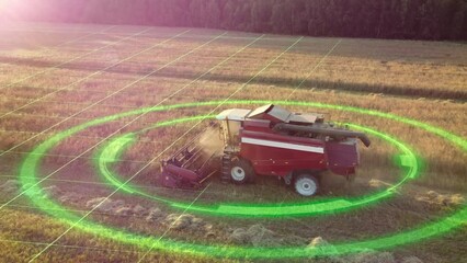 Autonomous, driverless electric grain harvester collects grain in an agricultural field in sunny sunset weather. Smart agriculture concept of the future. Self-driving harvesters ride on wheat field - Powered by Adobe