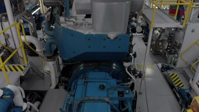 Gear and flywheel of propulsion in engine room of ship