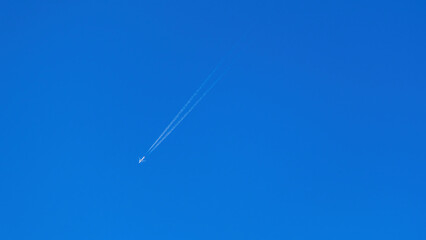 airplane in the blue sky